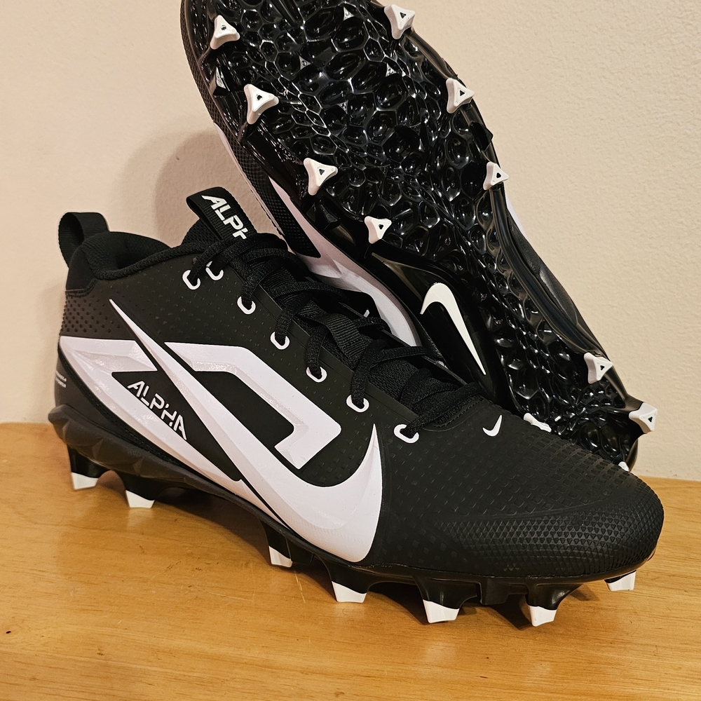 The Nike Alpha Menace 4 Varsity Pro Black Football Cleats in size 12.5 Men